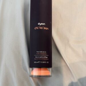 Dyson Chi To San Serum with Black and Orange Packaging